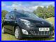 2010_Renault_Grand_Scenic_1_4_Petrol_TCe_Dynamique_7_Seater_5dr_MPV_01_dbe